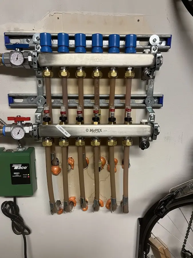 Plumber performing Water Heater Repair at a residential property in Buhl